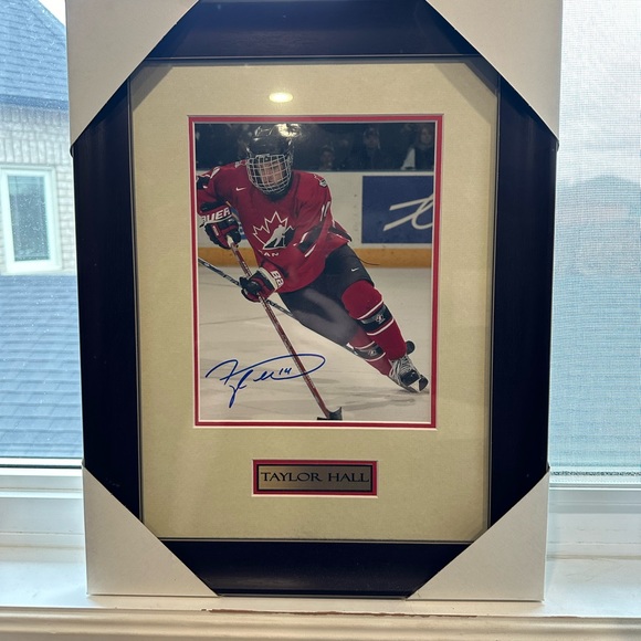 Framed and Signed Taylor Hall Autograph - Picture 1 of 3